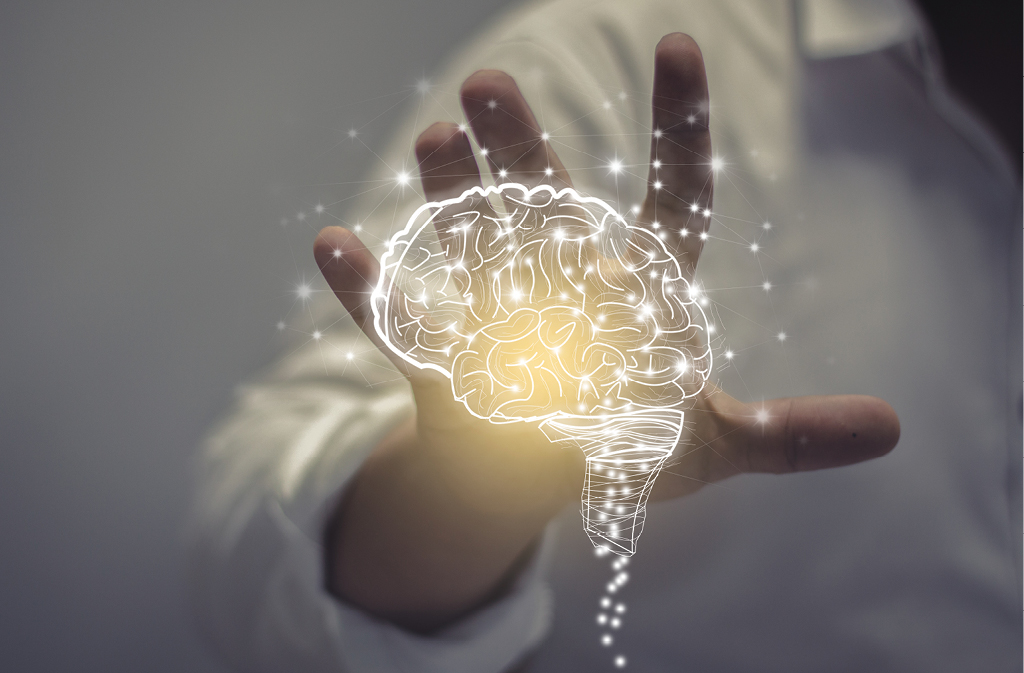 Person holding out hand with graphic of brain