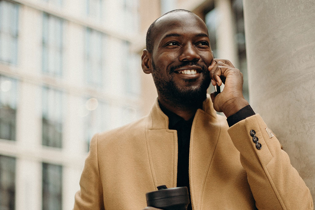 Business man outside on phone