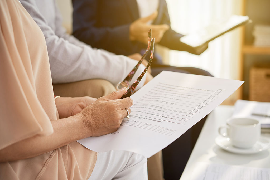 Older couple going over paperwork