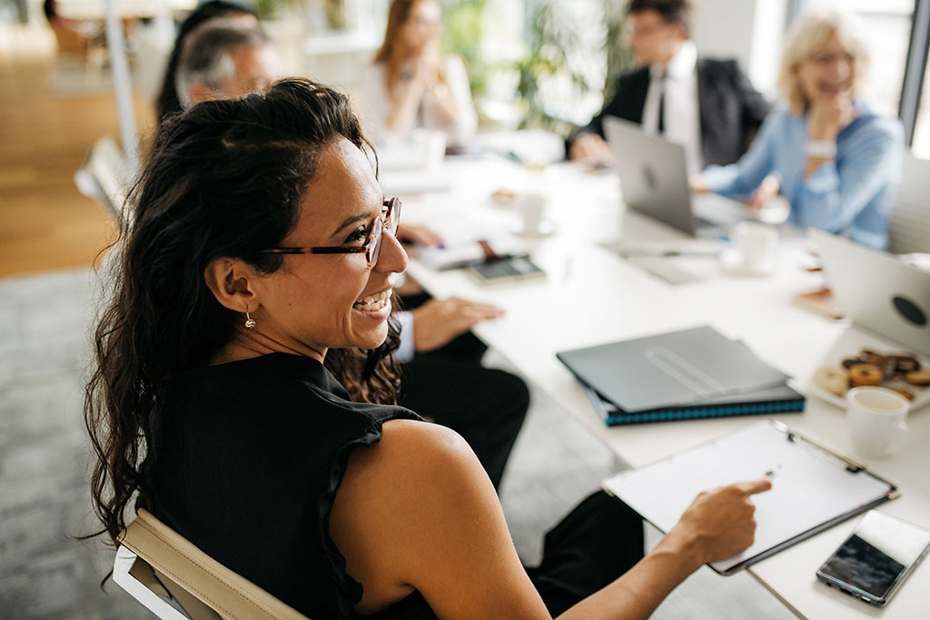 Co-workers happy in meeting