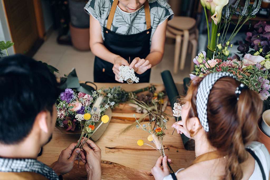 Business owner hosting flower bouquet class