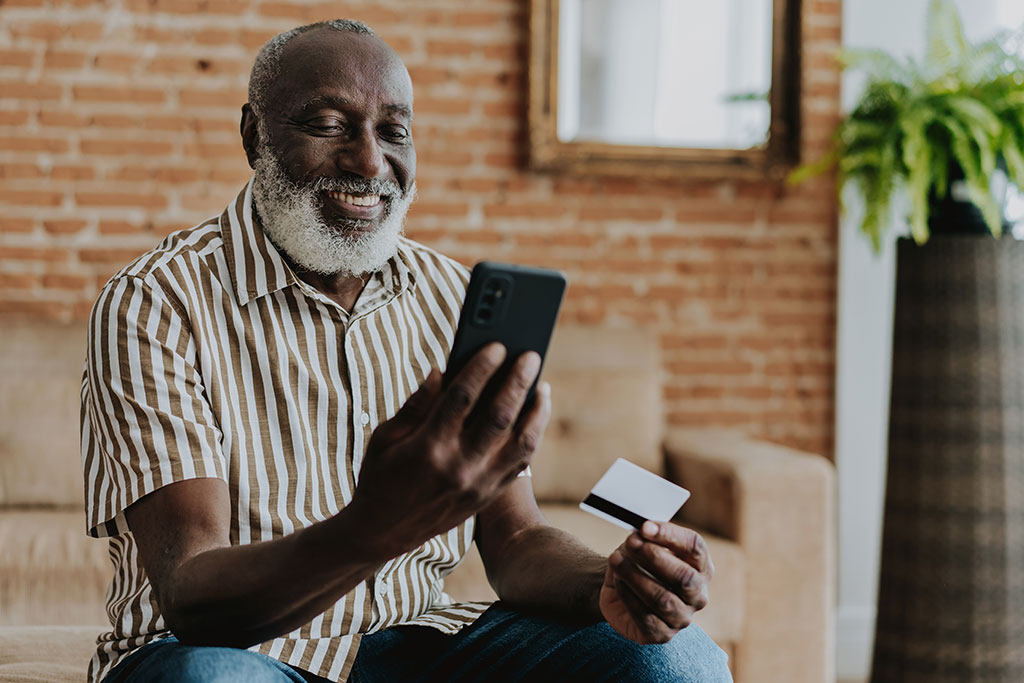 Man making purchase from phone