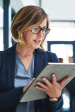 Business woman using tablet