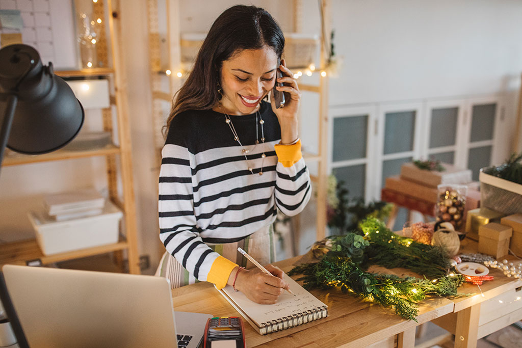 Small business owner on phone