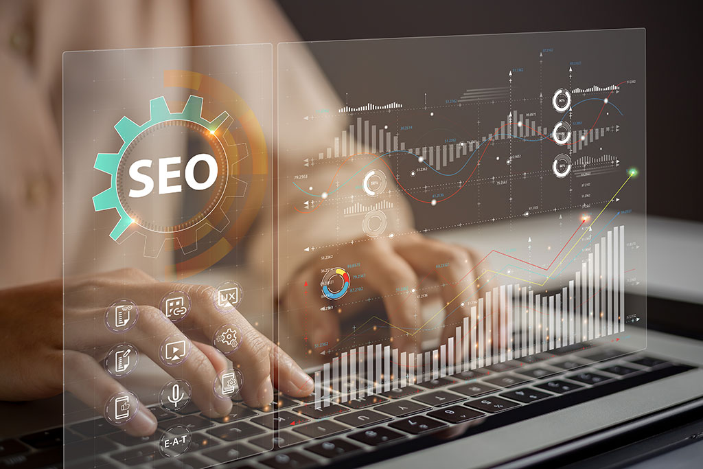 SEO graphics above laptop