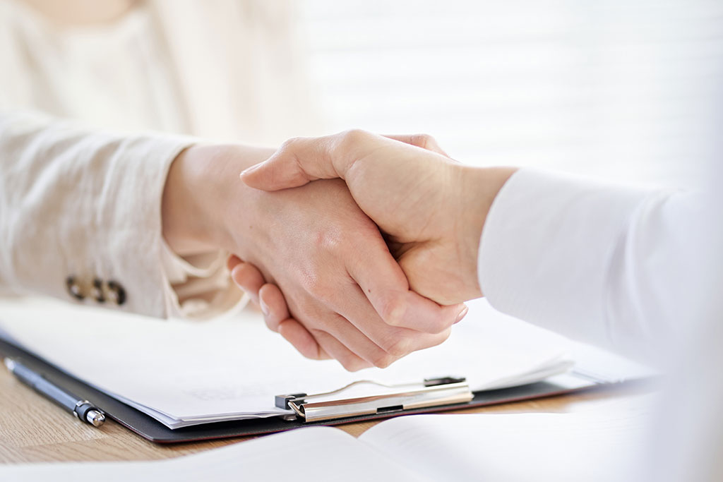 Business people shaking hands