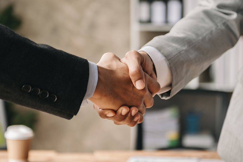 Business people shaking hands