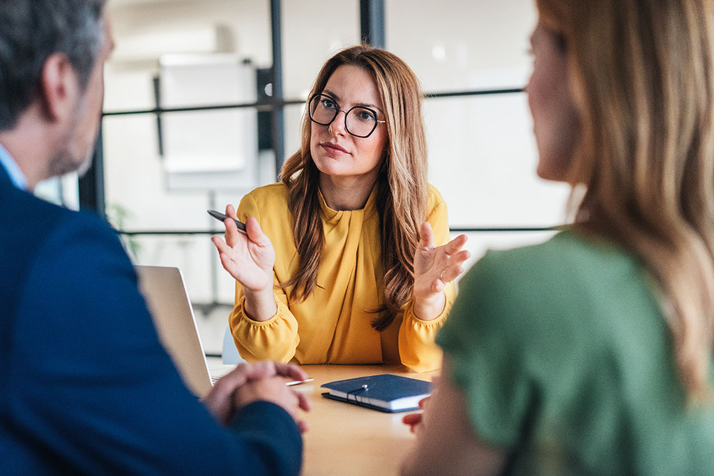 Advisor talking to couple