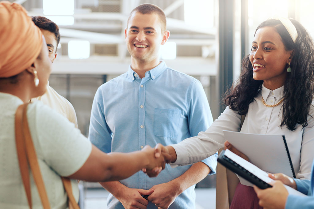 Business people shaking hands meeting for first time